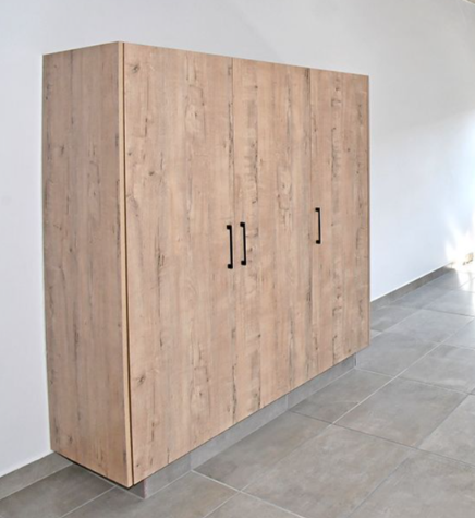 Light oak wood-grain hinged built-in wardrobe with black handles, Durban