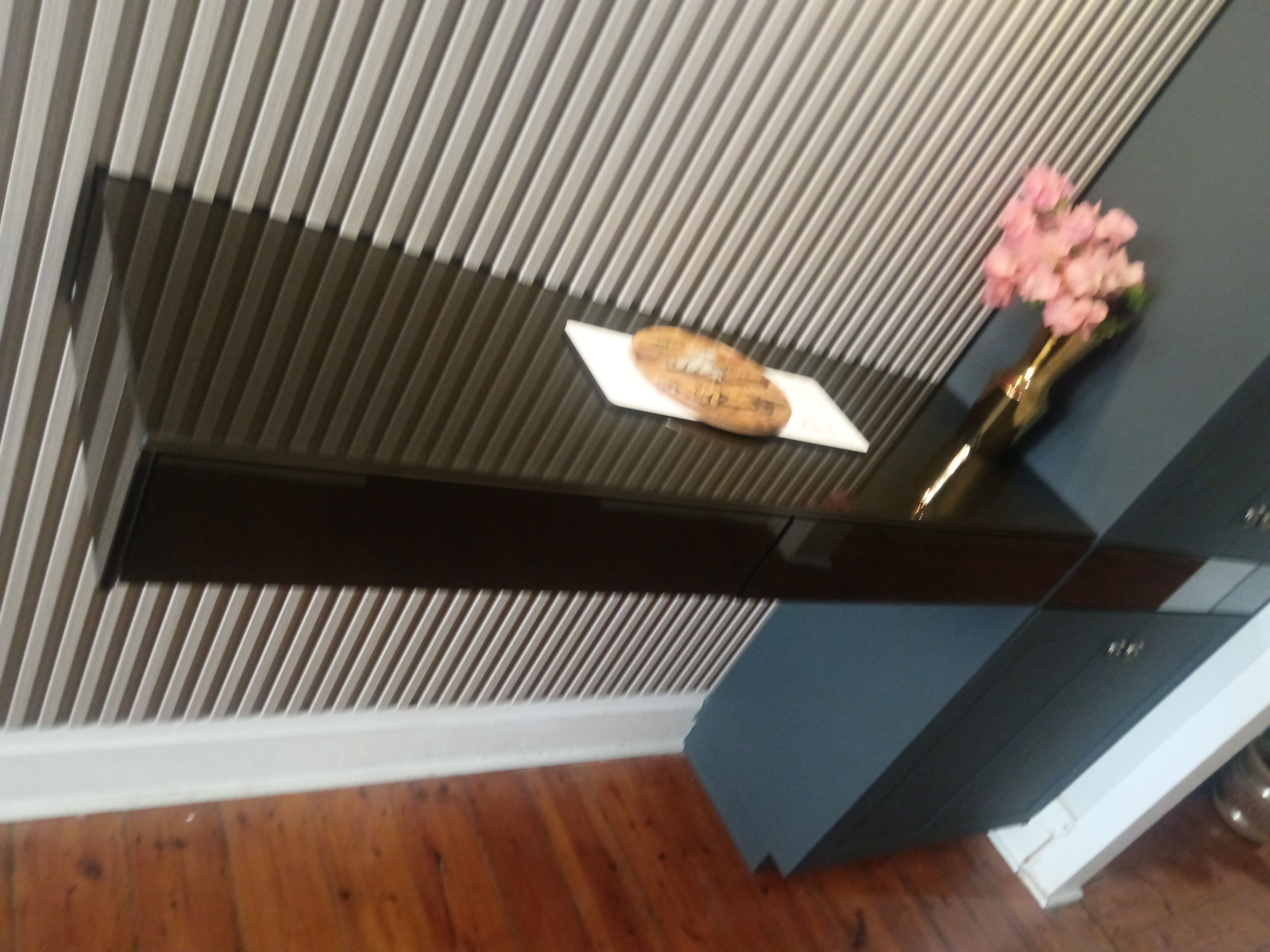 TV room after renovation with custom entertainment unit