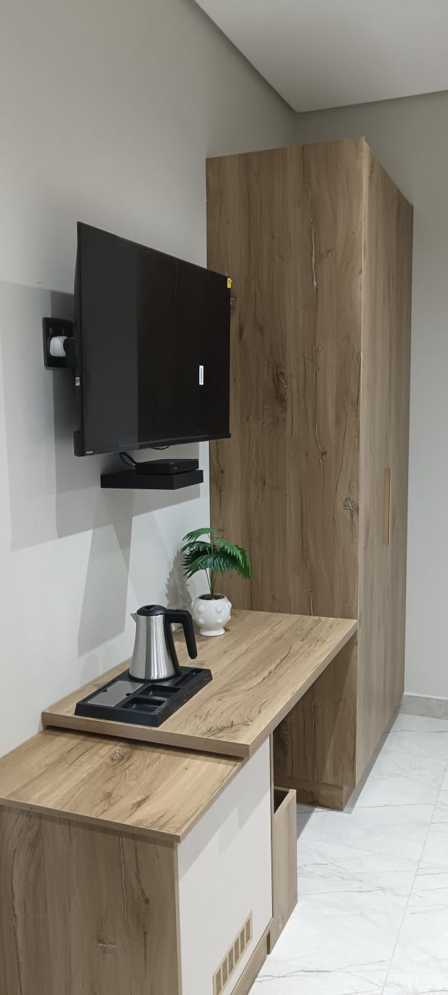 Cato Lux Suites Hotel Carpentry - Custom headboards and bathroom vanities