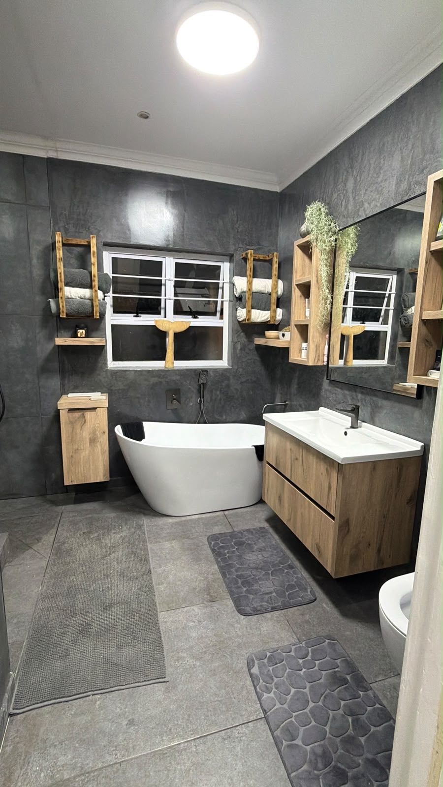 Detail view of bathroom vanity storage and finishes