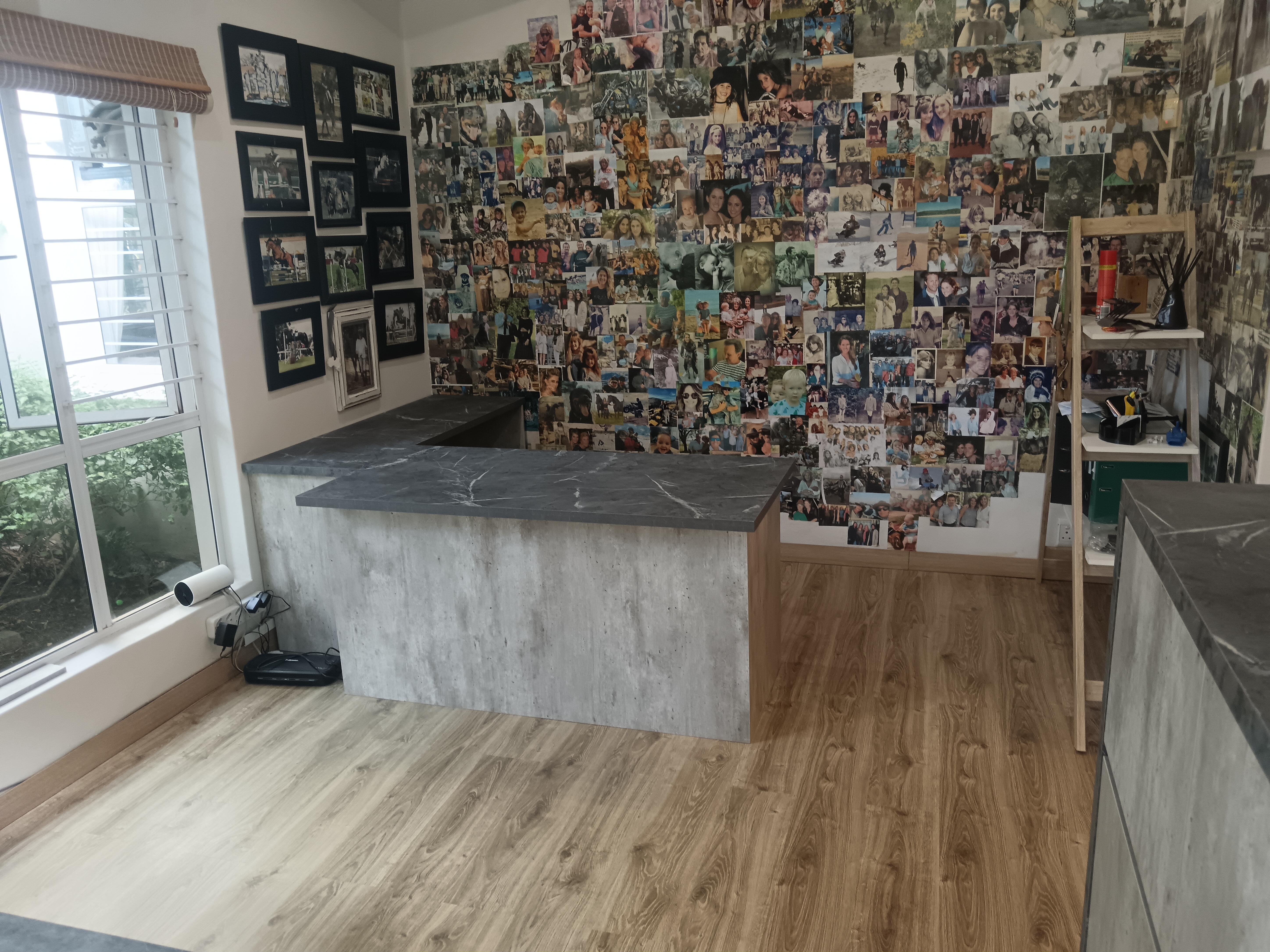 Completed custom home office station with integrated desk and shelving