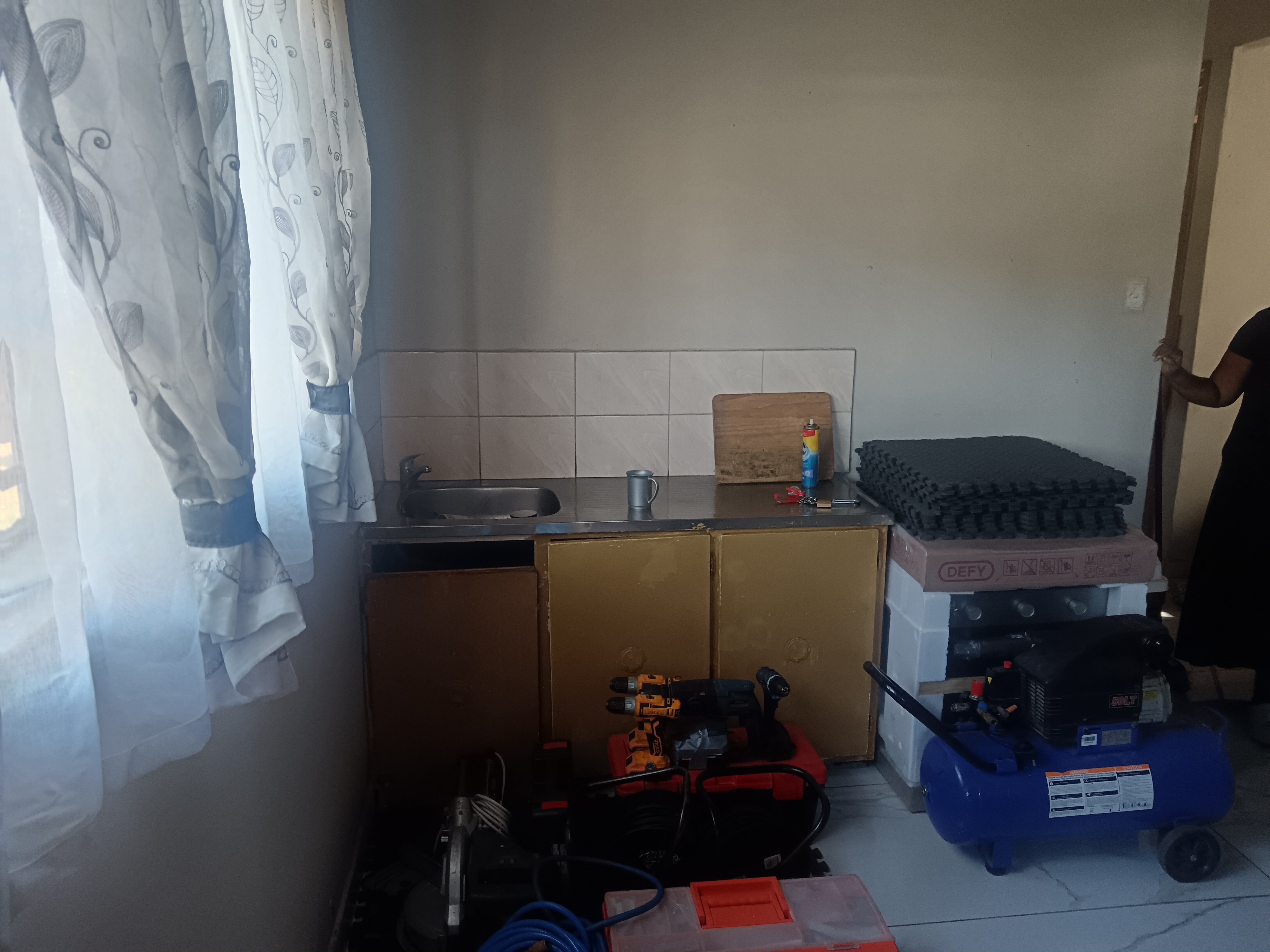 Full kitchen before - Phoenix flats