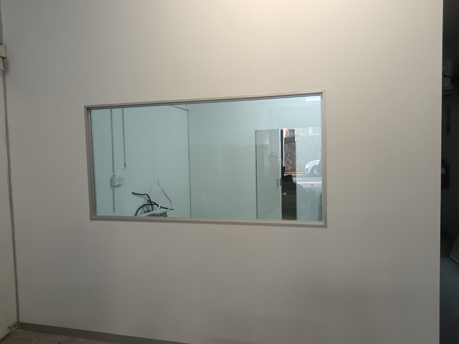 Completed drywall office wall with glass window in Pinetown