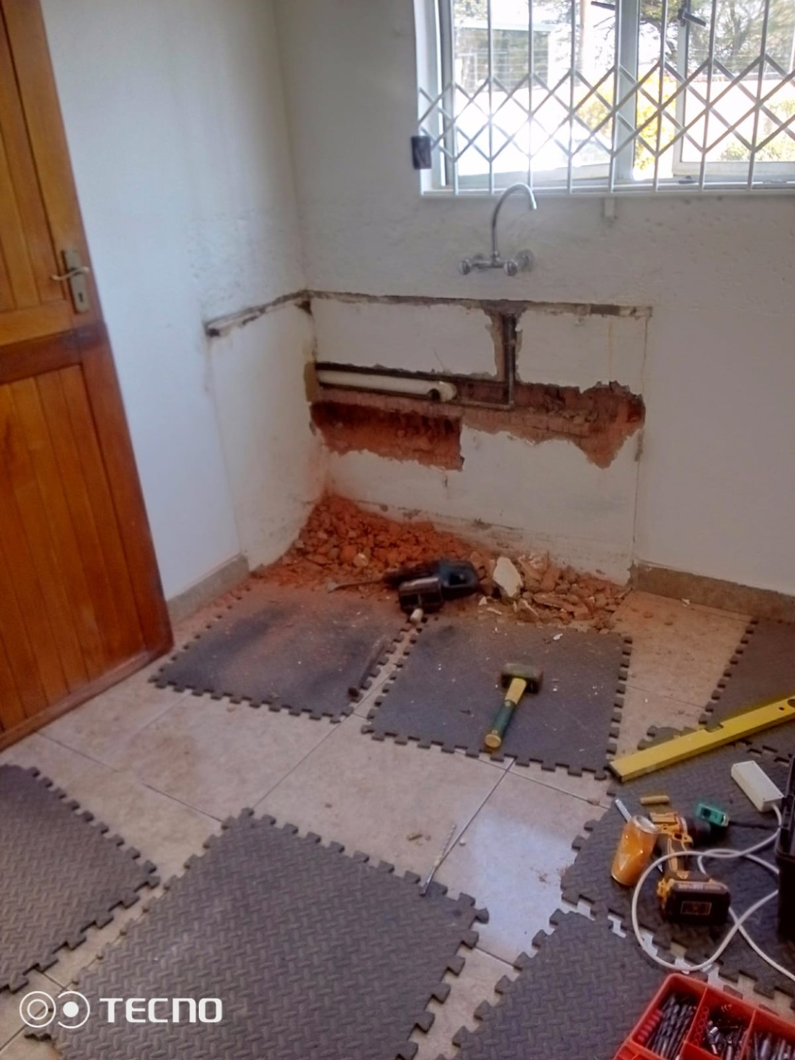 Plumbing prep before cupboard installation - Yvonne's kitchen Phoenix