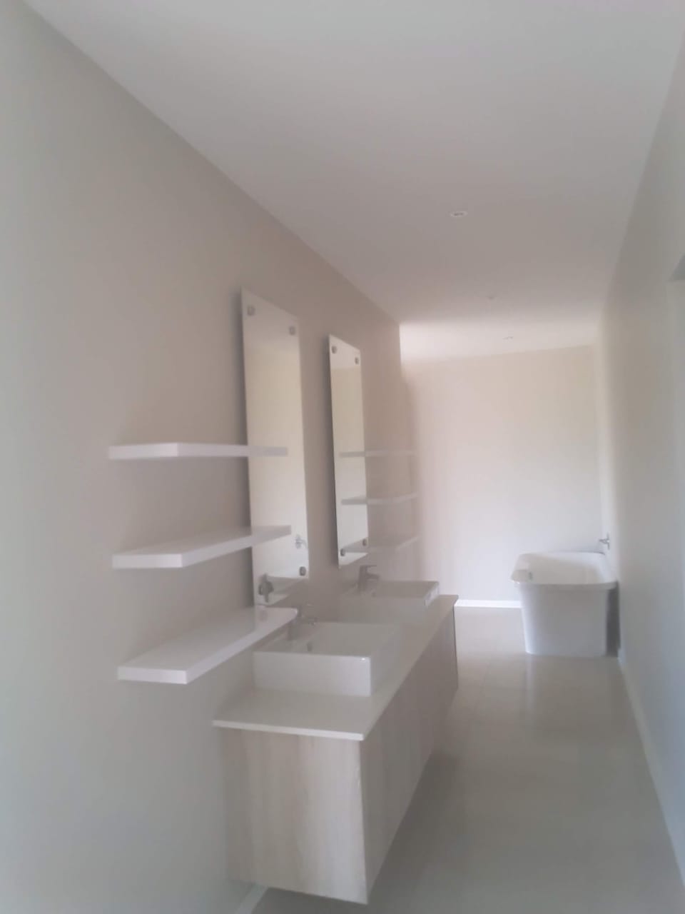 Built-in bedroom cupboards smoked mirror Simbithi Eco-Estate