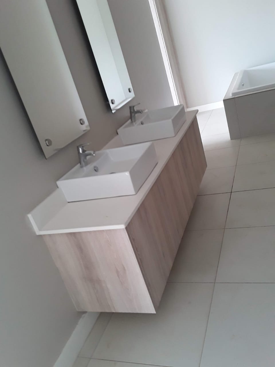 Double basin vanity timber oak Simbithi Eco-Estate master bathroom