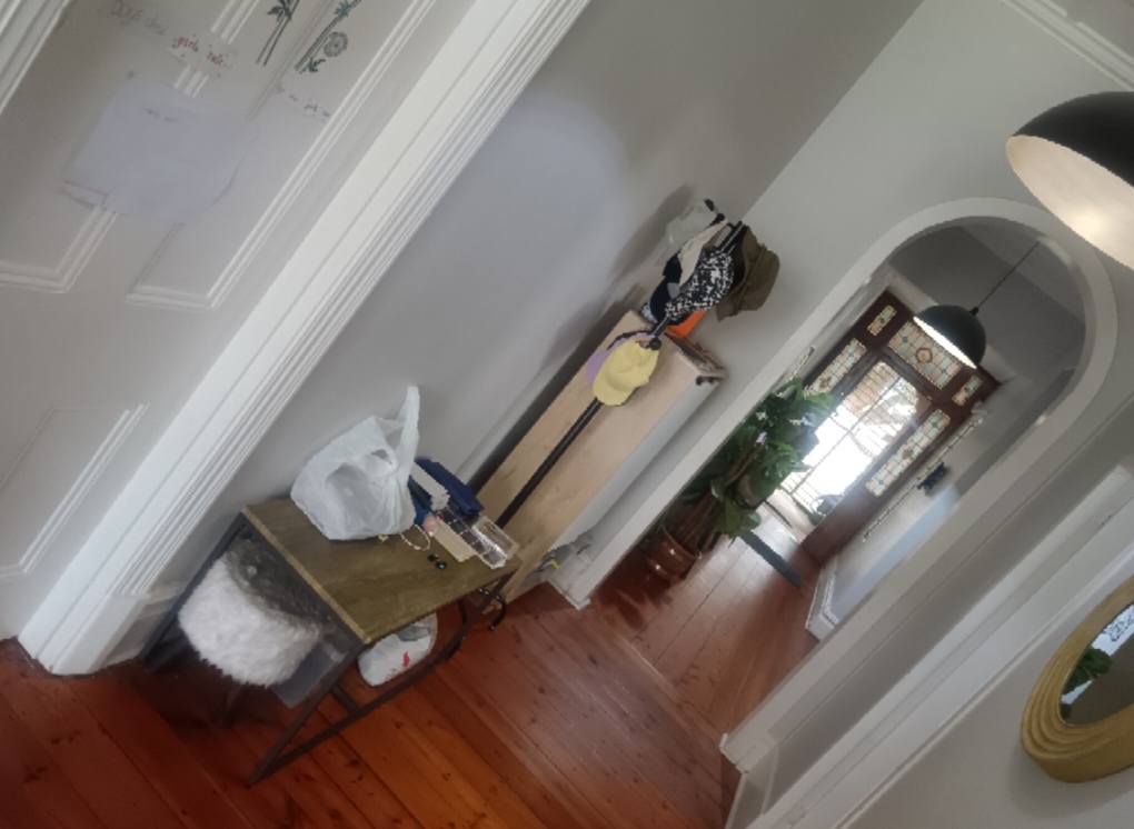 Passage and living room before renovation in Berea